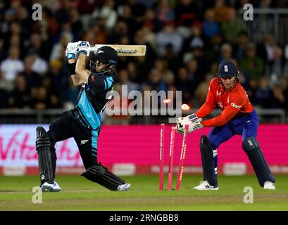 New Zealand's Mitchell Santner bowled out by England's Will Jacks during the second Vitality IT20 match at Emirates Old Trafford, Manchester. Picture date: Friday September 1, 2023. Stock Photo