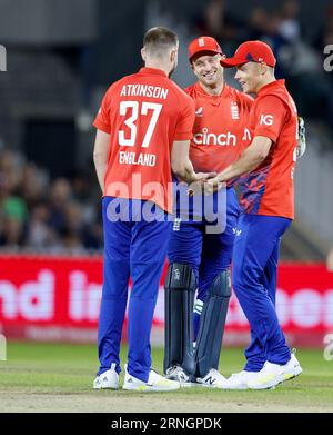 Old Trafford, Manchester, UK. 1st Sep, 2023. 2nd IT20, England versus New Zealand; Gus Atkinson of England (37) is congratulated by team mates after taking the wicket of Tim Seifert of New Zealand caught Jos Buttler (Centre) for 39 Credit: Action Plus Sports/Alamy Live News Stock Photo