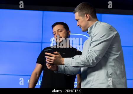 Kyiv, Ukraine. 01st Sep, 2023. Ukrainian Minister of Digital Transformation Mykhailo Fedorov, right, shows President Volodymyr Zelenskyy, left, the new Mriia digital educational phone app during the Day of Knowledge, September 1 2023 in Kyiv, Ukraine. Credit: Ukraine Presidency/Ukrainian Presidential Press Office/Alamy Live News Stock Photo