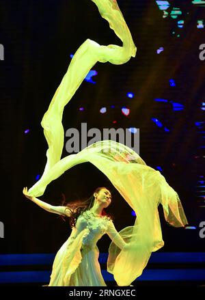 (161015) -- CHANGCHUN, Oct. 15, 2016 -- A dancer performs during the closing ceremony of the Changchun Film Festival in Changchun, northeast China s Jilin Province, Oct. 15, 2016. The film festival closed here Saturday. Chinese film stars Huang Xiaoming and Bai Baihe won the festival s best actor and actress awards. Hong Kong film director Derek Tung-Shing Yee was honored the best director s award. The best Chinese language film award was conferred to Xuan Zang . ) (yxb) CHINA-JILIN-CHANGCHUN FILM FESTIVAL-CLOSING (CN) XuxChang PUBLICATIONxNOTxINxCHN   161015 Changchun OCT 15 2016 a Dancer per Stock Photo