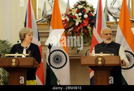 (161107) -- NEW DELHI, Nov. 7, 2016 -- Indian Prime Minister Narendra Modi (R) and visiting British Prime Minister Theresa May attend a joint press conference at Hyderabad House in New Delhi, India, Nov. 7, 2016. British Prime Minister Theresa May arrived in New Delhi late Sunday night on a three-day trade-focused visit aiming at bolstering bilateral ties in the key areas of trade, investment, defence and security. )(zhf) INDIA-NEW DELHI-BRITAIN-PM-VISIT ParthaxSarkar PUBLICATIONxNOTxINxCHN   New Delhi Nov 7 2016 Indian Prime Ministers Narendra Modes r and Visiting British Prime Ministers Ther Stock Photo