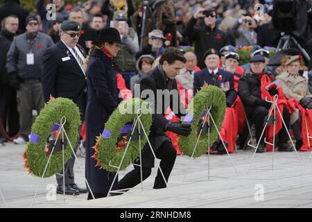 (161111) -- OTTAWA, Nov. 11, 2016 -- Canadian Prime Minister Justin Trudeau lays a wreath during Remembrance Day ceremonies at the National War Memorial in Ottawa, capital of Canada, on Nov. 11, 2016. Every year on Nov. 11, Canadians reflect honour on their war veterans and fallen soldiers by wearing a poppy and observing a moment of silence on the 11th minute of the 11th hour of the day. ) CANADA-OTTAWA-REMEMBRANCE DAY DavidxKawai PUBLICATIONxNOTxINxCHN   161111 Ottawa Nov 11 2016 Canadian Prime Ministers Justin Trudeau Lays a Wreath during Remembrance Day Ceremonies AT The National was Memor Stock Photo