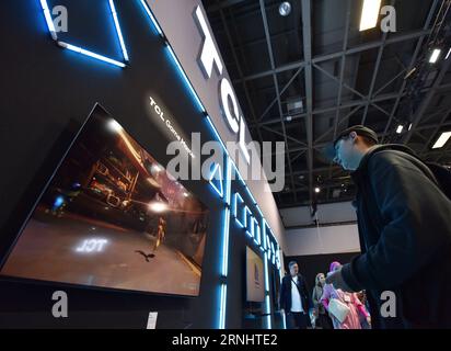 (230901) -- BERLIN, Sept. 1, 2023 (Xinhua) -- A visitor experiences an electronic game at the booth of Chinese company TCL during the IFA 2023 in Berlin, capital of Germany, on Sept. 1, 2023. As one of the world's leading trade fairs for consumer electronics, the five-day IFA 2023 opened here on Friday with over 2,000 exhibitors from 48 countries and regions, a much greater scale than last year. According to IFA official website, nearly 1,300 Chinese exhibitors have registered in this year's event. Chinese companies such as Hisense, TCL and Haier have occupied some of the largest exhibit areas Stock Photo