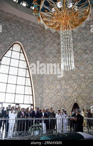 (161217) -- KARACHI (PAKISTAN), Dec. 17, 2016 -- Pakistani President Mamnoon Hussain and other officials pray during the inauguration ceremony of a newly installed chandelier at the Mazar-e-Quaid in southern Pakistani port city of Karachi, on Dec. 17, 2016. The new chandelier representing China-Pakistan friendship on Saturday was installed at the Mazar-e-Quaid, or the Mausoleum of Founder of Pakistan Muhammad Ali Jinnah, in Karachi, Pakistan, to replace the one given by the Chinese government 46 years ago. ) PAKISTAN-KARACHI-MAZAR-E-QUAID-CHANDELIER-RENEWAL CEREMONY Masroor PUBLICATIONxNOTxINx Stock Photo