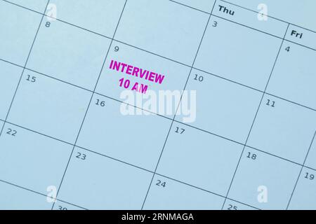 Concetto di colloquio di promemoria ore 10:00 - scrittura sul calendario Foto Stock