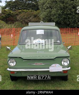 1963 auto a motore Hillman Imp verde in mostra. Il Gosport Car Rally è organizzato dal Rotary Club locale e si svolge a Stokes Bay il lunedì festivo di agosto. L'evento di quest'anno, che offriva una giornata economica in famiglia, è stato il settantesimo e ha ospitato auto e moto d'epoca, un allevamento di animali domestici, bancarelle, rinfreschi e un'arena che ha fornito varie forme di intrattenimento. Foto Stock