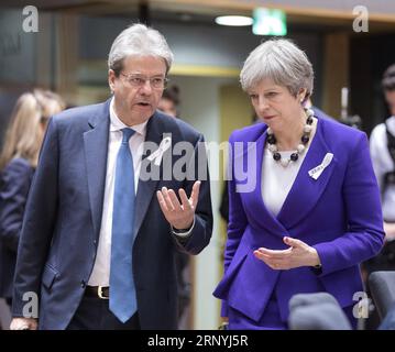 (180322) -- BRUXELLES, 22 marzo 2018 -- colloqui in uscita con il primo ministro italiano Paolo Gentiloni (L) con il primo ministro britannico Theresa May durante il vertice di primavera dell'Unione europea (UE) presso la sede dell'UE a Bruxelles, in Belgio, il 22 marzo 2018. ) VERTICE BELGIO-BRUXELLES-UE-PRIMAVERA ThierryxMonass PUBLICATIONxNOTxINxCHN Foto Stock