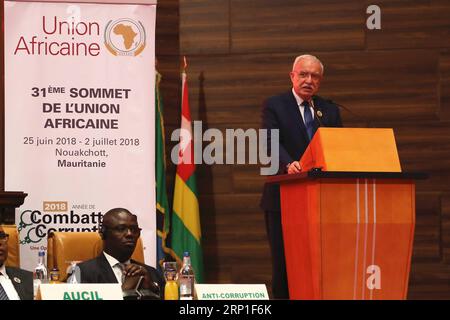 (180702) -- NOUAKCHOTT, 2 luglio 2018 -- il ministro degli affari esteri palestinese Riyad al-Maliki tiene un discorso al 31° vertice dell'Unione africana (UA) a Nouakchott, capitale della Mauritania, il 1° luglio 2018. I leader africani si sono incontrati qui per il vertice della 31esima UA di domenica, concentrandosi sull'anti-corruzione, sul commercio, la pace e la sicurezza. (ly) VERTICE MAURITANIA-NOUAKCHOTT-UNIONE AFRICANA ZhangxXuefei PUBLICATIONxNOTxINxCHN Foto Stock