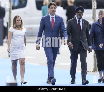 (180711) -- BRUXELLES, 11 luglio 2018 -- il primo ministro canadese Justin Trudeau (C) arriva ad un vertice della NATO a Bruxelles, in Belgio, l'11 luglio 2018. I leader della NATO si riuniscono a Bruxelles per una riunione di due giorni. )(yg) BELGIO-BRUXELLES-NATO-SUMMIT YexPingfan PUBLICATIONxNOTxINxCHN Foto Stock