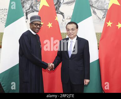 (180905) -- PECHINO, 5 settembre 2018 -- il Premier cinese li Keqiang (R) incontra il presidente nigeriano Muhammadu Buhari a Pechino, capitale della Cina, 5 settembre 2018. )(mp) CHINA-BEIJING-li KEQIANG-NIGERIAN PRESIDENT-MEETING (CN) PangxXinglei PUBLICATIONxNOTxINxCHN Foto Stock