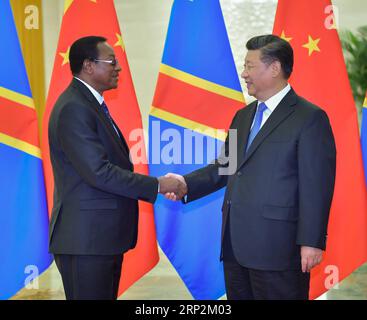 (180906) -- PECHINO, 6 settembre 2018 -- il presidente cinese Xi Jinping (R) incontra il primo ministro della Repubblica Democratica del Congo Bruno Tshibala nella grande sala del popolo di Pechino, capitale della Cina, 6 settembre 2018. )(MCG) CHINA-BEIJING-XI JINPING-DR CONGO S PM-MEETING (CN) LIXTAO PUBLICATIONXNOTXINXCHN Foto Stock