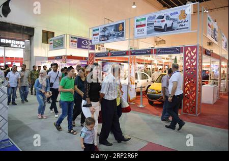 (180909) -- DAMASCO, 9 settembre 2018 -- i siriani visitano il padiglione iraniano alla Fiera internazionale di Damasco fuori Damasco, Siria, il 9 settembre 2018. La 60a Fiera Internazionale di Damasco è iniziata il 6 settembre, mentre il governo sta promuovendo opportunità di investimento in Siria in una situazione di sicurezza migliorata. SIRIA-DAMASCO-FIERA INTERNAZIONALE AmmarxSafarjalani PUBLICATIONxNOTxINxCHN Foto Stock