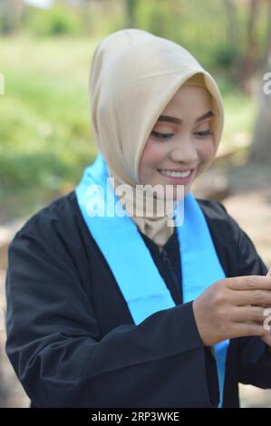 Buon giorno fotografico di laurea Foto Stock