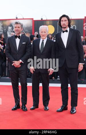 VENEZIA, ITALIA - agosto 31: Adam driver, Michael Mann e Patrick Dempsey assistono a un Red carpet per il film "Ferrari" al 80° Venice International Fil Foto Stock