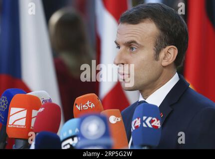 (181213) -- BRUXELLES, 13 dicembre 2018 -- il presidente francese Emmanuel Macron parla ai media al suo arrivo a un vertice UE di due giorni a Bruxelles, in Belgio, 13 dicembre 2018. ) BELGIO-BRUXELLES-UE-VERTICE YexPingfan PUBLICATIONxNOTxINxCHN Foto Stock