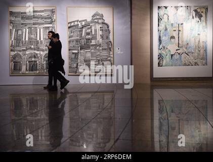 (190110) -- PECHINO, 10 gennaio 2019 (Xinhua) -- People visit the Exhibition of New Vision of Chinese Art 2018 a Pechino, capitale della Cina, 12 marzo 2018. Nel novembre 2013, il diciottesimo Comitato centrale del Partito Comunista Cinese tenne la sua terza sessione plenaria per concentrarsi sull'approfondimento completo delle riforme. Nei cinque anni successivi alla sessione, la Cina ha attuato una riforma del sistema culturale, inaugurando una nuova situazione di costruzione culturale socialista in una nuova era con una ferma fiducia culturale. (Xinhua/Luo Xiaoguang) CHINA-REFORM-CULTURAL CONFIDENCE(CN) PUBLICATIONxNOTxINxCHN Foto Stock