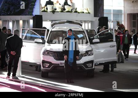 (190112) -- TEHERAN, 12 gennaio 2019 -- People visit the Teheran International Auto Show a Teheran, capitale dell'Iran, 11 gennaio 2019. Teheran Auto Show è uno dei più grandi eventi internazionali dell'industria automobilistica iraniana. ) IRAN-TEHERAN-INTERNATIONAL AUTO SHOW AhmadxHalabisaz PUBLICATIONxNOTxINxCHN Foto Stock