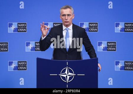 (190214) -- BRUXELLES, 14 febbraio 2019 -- il segretario generale della NATO Jens Stoltenberg partecipa a una conferenza stampa dopo la riunione dei ministri della difesa della NATO presso la sede della NATO a Bruxelles, in Belgio, 14 febbraio 2019. ) BELGIO-BRUXELLES-NATO-CONFERENZA STAMPA ZhengxHuansong PUBLICATIONxNOTxINxCHN Foto Stock