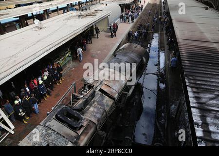 (190227) -- CAIRO, 27 febbraio 2019 -- foto scattata il 27 febbraio 2019 mostra la stazione ferroviaria dopo un incendio al Cairo, in Egitto. Almeno 20 persone sono rimaste uccise e più di 40 ferite quando un incendio scoppiò all'interno della stazione ferroviaria principale nel centro della città della capitale egiziana il Cairo mercoledì, ha riferito Nile TV. ) EGITTO-CAIRO-STAZIONE FERROVIARIA-FIRE AhmedxGomaa PUBLICATIONxNOTxINxCHN Foto Stock