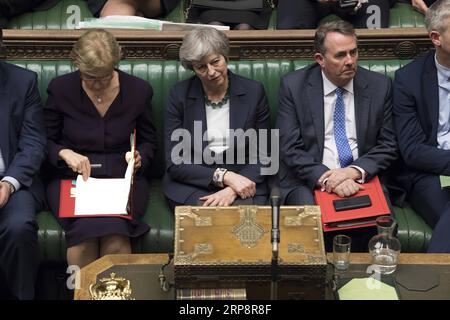 (190313) -- LONDRA, 13 marzo 2019 -- il primo ministro britannico Theresa May (C) è visto durante il voto di no-Deal Brexit alla camera dei comuni di Londra, in Gran Bretagna, il 13 marzo 2019. Mercoledì i deputati britannici hanno votato per respingere la Brexit senza accordo in qualsiasi momento sulla scia della sconvolgente sconfitta di martedì sera del primo ministro britannico Theresa May. PARLAMENTO DEL REGNO UNITO/) CREDITO OBBLIGATORIO AD HOC: PARLAMENTO DEL REGNO UNITO/ GRAN BRETAGNA-LONDRA-NO-DEAL BREXIT-MPS-REJECTION MARKXDUFFY PUBLICATIONXNOTXINXCHN Foto Stock