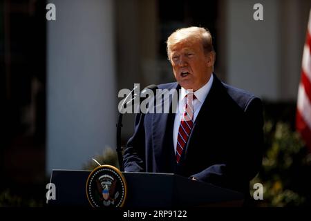 (190320) -- WASHINGTON D.C., 20 marzo 2019 (Xinhua) -- il presidente degli Stati Uniti Donald Trump partecipa a una conferenza stampa congiunta con il suo omologo brasiliano Jair Bolsonaro (non nella foto) al Rose Garden della Casa Bianca a Washington D.C., negli Stati Uniti, il 19 marzo 2019. Martedì il presidente degli Stati Uniti Donald Trump ha indicato che potrebbe sostenere il Brasile per aderire all'Organizzazione del Trattato del Nord Atlantico (NATO) e all'Organizzazione per la cooperazione e lo sviluppo economico (OCSE), poiché le due nazioni si aspettavano di promuovere la loro cooperazione economica. (Xinhua/Ting Shen) USA-WASHINGTON D.C.-TRUMP-BRASILE Foto Stock