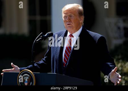 (190320) -- WASHINGTON D.C., 20 marzo 2019 (Xinhua) -- il presidente degli Stati Uniti Donald Trump partecipa a una conferenza stampa congiunta con il suo omologo brasiliano Jair Bolsonaro (non nella foto) al Rose Garden della Casa Bianca a Washington D.C., negli Stati Uniti, il 19 marzo 2019. Martedì il presidente degli Stati Uniti Donald Trump ha indicato che potrebbe sostenere il Brasile per aderire all'Organizzazione del Trattato del Nord Atlantico (NATO) e all'Organizzazione per la cooperazione e lo sviluppo economico (OCSE), poiché le due nazioni si aspettavano di promuovere la loro cooperazione economica. (Xinhua/Ting Shen) USA-WASHINGTON D.C.-TRUMP-BRASILE Foto Stock