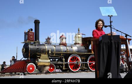 (190511) - SALT LAKE CITY, 11 maggio 2019 (Xinhua) -- il Segretario dei trasporti Elaine L. Chao tiene un discorso durante la celebrazione del 150° anniversario del completamento della prima ferrovia transcontinentale della nazione, al quale migliaia di lavoratori ferroviari cinesi hanno dato un grande contributo, presso il Golden Spike National Historical Park a Promontory Summit, un'area di altura a circa 100 km a nord-ovest di Salt Lake City, negli Stati Uniti, il 10 maggio 2019. La prima ferrovia transcontinentale, nota anche come Pacific Railroad, era una linea ferroviaria continua di 3.000 km più lin Foto Stock