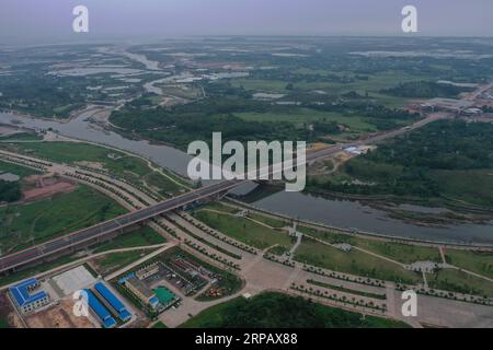 (190520) -- NANNING, 20 maggio 2019 (Xinhua) -- foto aerea scattata il 15 aprile 2019 mostra il ponte Beilun II al confine tra Cina e Vietnam. Il Guangxi ha svolto un ruolo sempre più importante nell'ambito dell'iniziativa Belt and Road. (Xinhua/Cao Yiming) CHINA-GUANGXI-BELT AND ROAD INITIATIVE (CN) PUBLICATIONxNOTxINxCHN Foto Stock