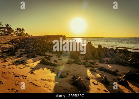 Tramonto sulla spiaggia di Port Hedland, Washington, Australia Foto Stock