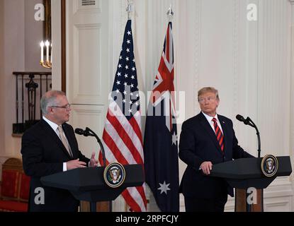 190920 -- WASHINGTON, 20 settembre 2019 -- il presidente degli Stati Uniti Donald Trump R partecipa a una conferenza stampa congiunta con la visita del primo ministro australiano Scott Morrison alla Casa Bianca a Washington D.C., negli Stati Uniti, il 20 settembre 2019. Donald Trump venerdì si è difeso da una denuncia di informatori sulle presunte interazioni inappropriate del presidente con un leader straniero, definendolo un altro lavoro di hack politico durante una disponibilità congiunta della stampa con Scott Morrison. U.S.-WASHINGTON D.C.-TRUMP-AUSTRALIA-PM-CONFERENZA STAMPA HUXYOUSONG PUBLICATIONXNOTXINXCHN Foto Stock