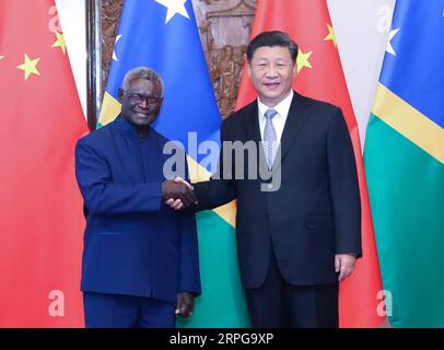 191009 -- PECHINO, 9 ottobre 2019 -- il presidente cinese Xi Jinping incontra il primo ministro delle Isole Salomone Manasseh Sogavare presso la Diaoyutai State Guesthouse a Pechino, capitale della Cina, 9 ottobre 2019. CHINA-PECHINO-XI JINPING-ISOLE SALOMONE-PM-RIUNIONE CN YAOXDAWEI PUBLICATIONXNOTXINXCHN Foto Stock