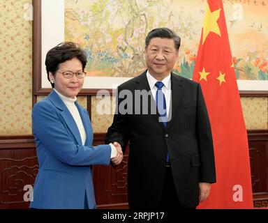 News Themen der Woche KW51 News Bilder des Tages 191216 - PECHINO, 16 dicembre 2019 - il presidente cinese Xi Jinping incontra l'amministratore delegato della regione amministrativa speciale di Hong Kong HKSAR Carrie Lam a Pechino, capitale della Cina, 16 dicembre 2019. Carrie Lam è in visita a Pechino. CHINA-BEIJING-XI JINPING-CARRIE LAM-MEETING CN LIXXUEREN PUBLICATIONXNOTXINXCHN Foto Stock