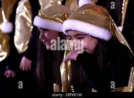 191231 -- PECHINO, 31 dicembre 2019 -- i bambini siriani cantano in un concerto in occasione del Natale e del Capodanno a Damasco, Siria, il 30 dicembre 2019. Foto di /Xinhua XINHUA FOTO DEL GIORNO AmmarxSafarjalani PUBLICATIONxNOTxINxCHN Foto Stock