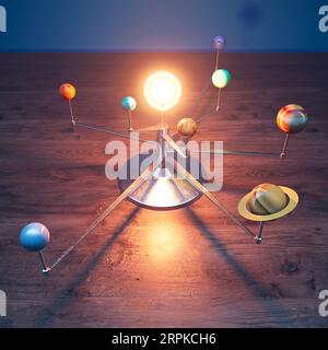 Il sistema Toy Solar modella i pianeti sulle braccia che girano intorno al Sole Foto Stock