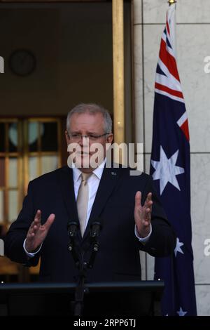 200312 -- CANBERRA, 12 marzo 2020 -- il primo ministro australiano Scott Morrison partecipa a una conferenza stampa presso il Parlamento di Canberra, Australia, 12 marzo 2020. Il governo australiano ha annunciato giovedì un pacchetto di stimolo per il coronavirus da 11,35 miliardi di dollari australiani. Le misure, che valgono più dell'1% del PIL del prodotto interno lordo australiano, includono incentivi agli investimenti accelerati e sussidi salariali per gli apprendisti commerciali. Foto di /Xinhua AUSTRALIA-CANBERRA-COVID-19-ECONOMY-PLAN ChuxChen PUBLICATIONxNOTxINxCHN Foto Stock