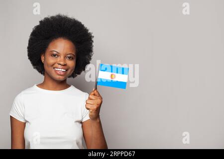 Donna argentina con bandiera argentina educazione, affari, cittadinanza e patriottismo Foto Stock