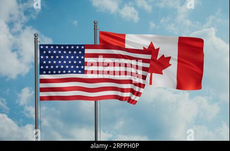 Canada e Stati Uniti sventolano insieme nel vento sul cielo blu, concetto di cooperazione tra due paesi Foto Stock