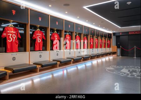 Il camerino del Manchester United presso lo stadio Old Trafford di Manchester, Regno Unito Foto Stock