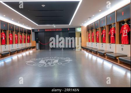 Il camerino del Manchester United presso lo stadio Old Trafford di Manchester, Regno Unito Foto Stock