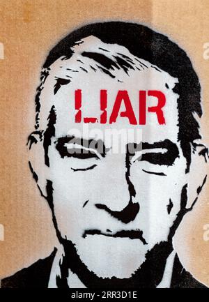 Ritratto di Sadiq Khan con "bugiardo" scritto sulla fronte Foto Stock