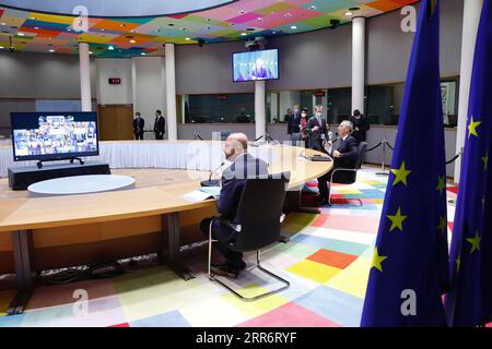 210227 -- BRUXELLES, 27 febbraio 2021 -- il presidente del Consiglio europeo Charles Michel L e il segretario generale della NATO dell'Organizzazione del Trattato del Nord Atlantico Jens Stoltenberg partecipano al secondo giorno del vertice virtuale a Bruxelles, in Belgio, 26 febbraio 2021. Venerdì i leader degli stati membri dell'UE hanno ribadito il loro impegno ad aumentare la capacità dell'UE di agire autonomamente nel contesto del loro dibattito strategico sulla politica europea di sicurezza e di difesa, nonché la necessità che il blocco si assuma maggiori responsabilità per la sua sicurezza. Concludendo un vertice virtuale di due giorni, i capi di Stato e di governo agr Foto Stock