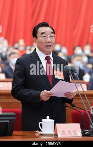 210304 -- PECHINO, 4 marzo 2021 -- Zhang Qingli presiede la riunione di apertura della quarta sessione del 13° Comitato Nazionale della Conferenza consultiva politica del popolo cinese CPPCC presso la grande sala del popolo di Pechino, capitale della Cina, 4 marzo 2021. DUE SESSIONSCHINA-PECHINO-ZHANG QINGLI-CPPCC-SESSIONE ANNUALE-APERTURA CN JUXPENG PUBLICATIONXNOTXINXCHN Foto Stock