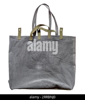 vista frontale della borsa tote vuota in velluto grigio realizzata a mano, isolata su sfondo bianco Foto Stock
