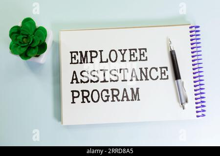 Testo aziendale del programma di assistenza ai dipendenti sul cartellino giallo. Foto Stock