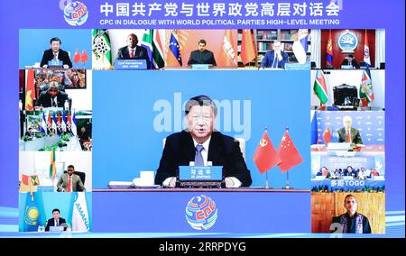 230315 -- PECHINO, 15 marzo 2023 -- Xi Jinping, segretario generale del Comitato centrale del PCC del Partito Comunista Cinese e presidente cinese, partecipa alla riunione ad alto livello del PCC in Dialogue with World Political Parties tramite link video e tiene un discorso a Pechino, capitale della Cina, il 15 marzo 2023. CHINA-BEIJING-XI JINPING-CPC IN DIALOGO CON I PARTITI POLITICI MONDIALI RIUNIONE AD ALTO LIVELLO CN LIUXBIN PUBLICATIONXNOTXINXCHN Foto Stock