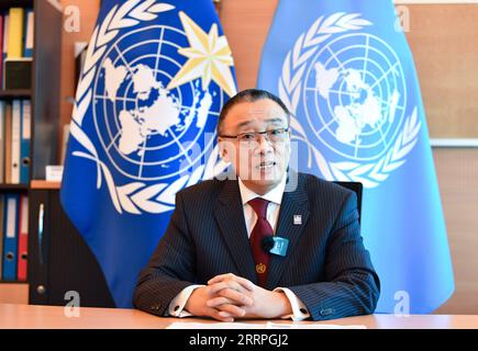 230324 -- GINEVRA, 24 marzo 2023 -- Zhang Wenjian, assistente segretario generale dell'Organizzazione meteorologica Mondiale WMO, parla in un'intervista con l'agenzia di stampa Xinhua a Ginevra, in Svizzera, 19 novembre 2022. I progressi della Cina nella scienza e nella tecnologia meteorologica hanno beneficiato non solo la sua popolazione ma anche il resto del mondo, ha detto Zhang. PER ANDARE CON l'intervista: La tecnologia meteorologica all'avanguardia della Cina sta avvantaggiando il mondo, afferma il WMO ufficiale SVIZZERA-GINEVRA-WMO-INTERVISTA LianxYi PUBLICATIONxNOTxINxCHN Foto Stock