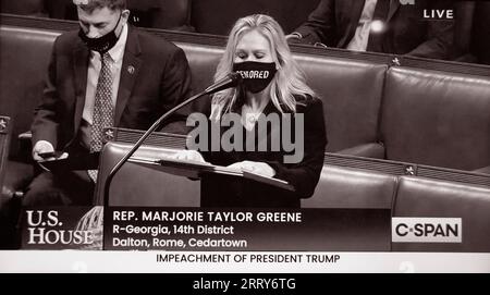 Uno screenshot C-SPAN della Rep. Marjorie Taylor Greene che parla ai colleghi del piano della camera il 13 gennaio 2021. Foto Stock