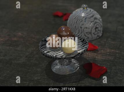 Palline di cioccolato su un supporto per torte di vetro Foto Stock