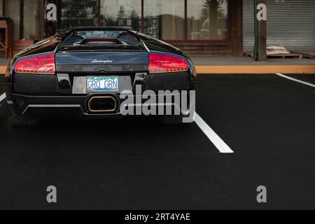 Black Lamborghini Gallardo parcheggiata in una strada di Vancouver BC Canada. Auto sportiva Lamborghini all'aperto. Vista posteriore della Lamborghini supercar-Editoriale, stre Foto Stock