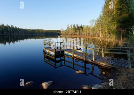 Tramonto al lago Erilampi, lago remoto Lakeland Carelia Finlandia Foto Stock